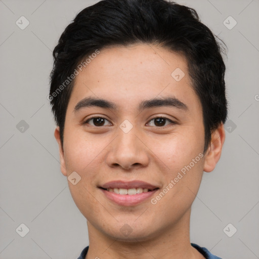 Joyful asian young-adult male with short  black hair and brown eyes