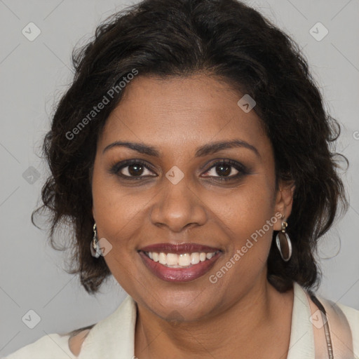 Joyful black young-adult female with medium  brown hair and brown eyes