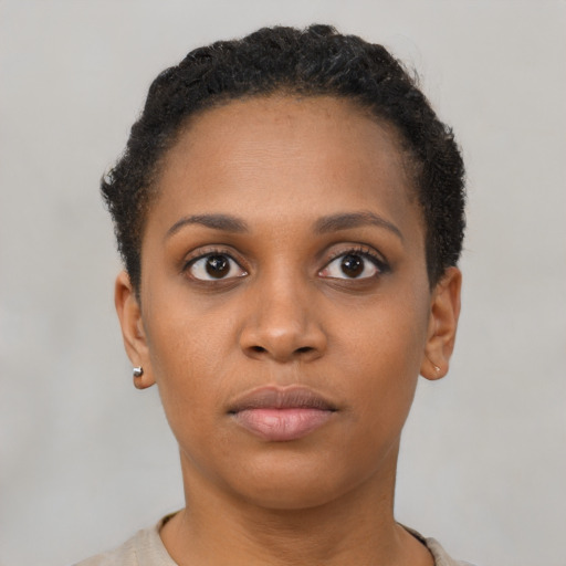 Neutral black young-adult female with short  brown hair and brown eyes