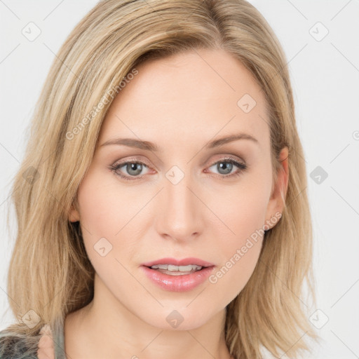 Joyful white young-adult female with long  brown hair and blue eyes