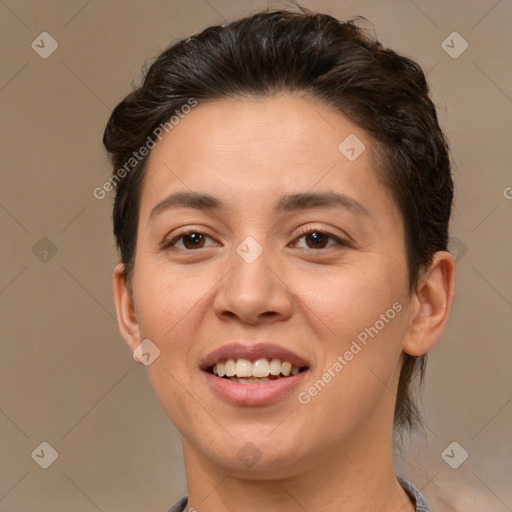 Joyful white young-adult female with short  brown hair and brown eyes