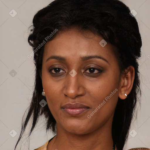 Joyful black young-adult female with medium  black hair and brown eyes