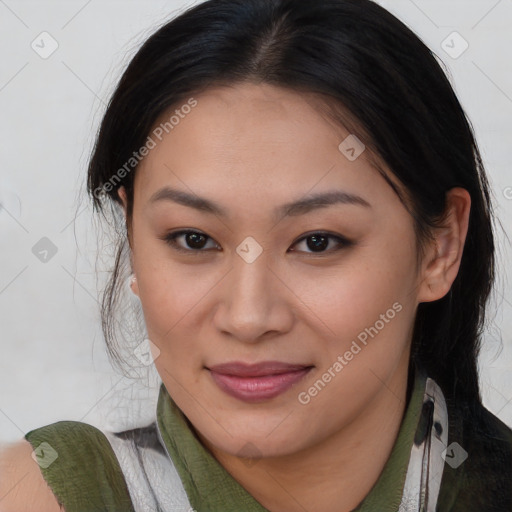 Joyful asian young-adult female with medium  brown hair and brown eyes