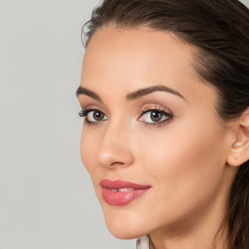 Neutral white young-adult female with medium  brown hair and brown eyes