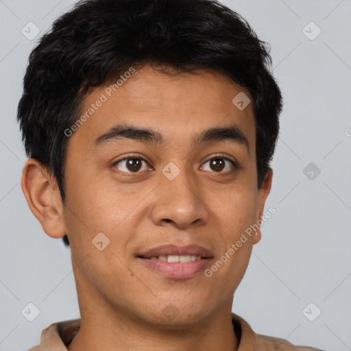 Joyful asian young-adult male with short  brown hair and brown eyes