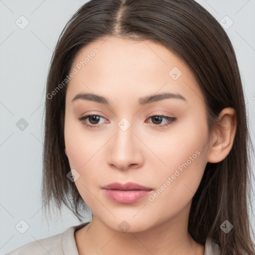 Neutral white young-adult female with long  brown hair and brown eyes