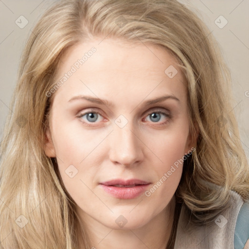 Joyful white young-adult female with long  brown hair and blue eyes