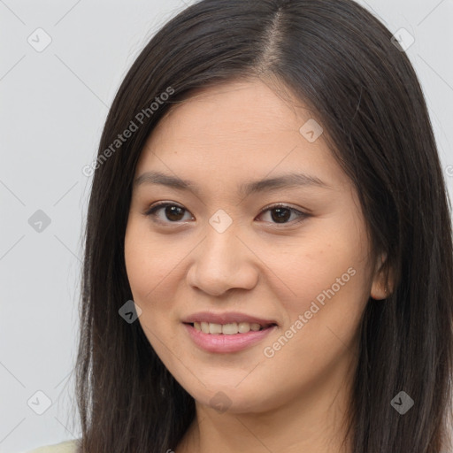 Joyful white young-adult female with long  brown hair and brown eyes