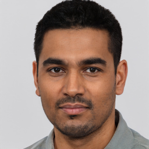Neutral latino young-adult male with short  black hair and brown eyes