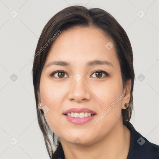 Joyful white young-adult female with long  brown hair and brown eyes
