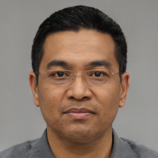 Neutral asian adult male with short  black hair and brown eyes