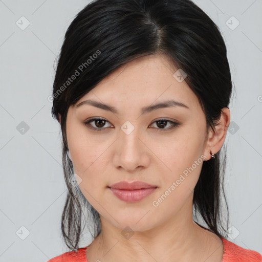 Joyful asian young-adult female with medium  black hair and brown eyes