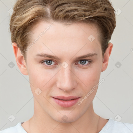 Joyful white young-adult female with short  brown hair and grey eyes