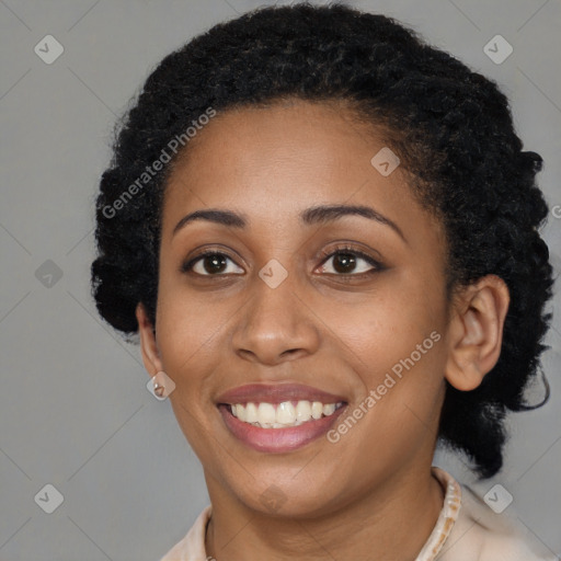 Joyful latino young-adult female with short  black hair and brown eyes