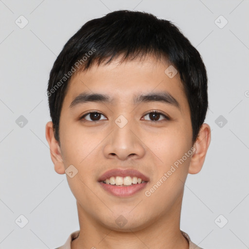 Joyful asian young-adult male with short  black hair and brown eyes