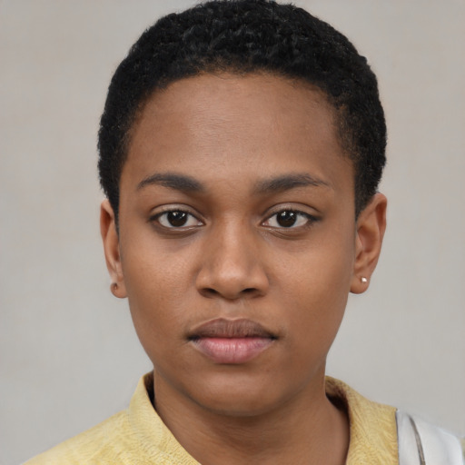 Neutral black young-adult female with short  black hair and brown eyes