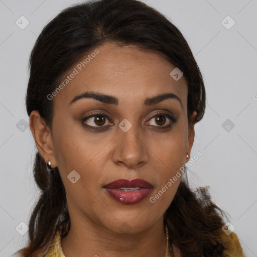 Joyful latino young-adult female with long  brown hair and brown eyes