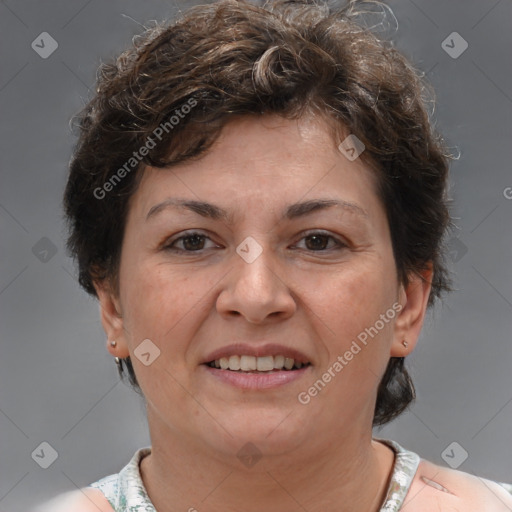 Joyful white adult female with short  brown hair and brown eyes