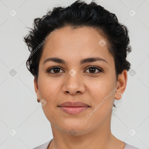 Joyful latino young-adult female with short  brown hair and brown eyes