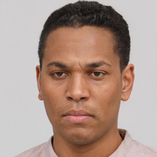 Neutral latino adult male with short  black hair and brown eyes