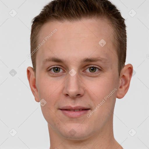 Joyful white young-adult male with short  brown hair and grey eyes