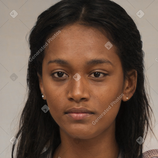 Neutral black young-adult female with long  brown hair and brown eyes