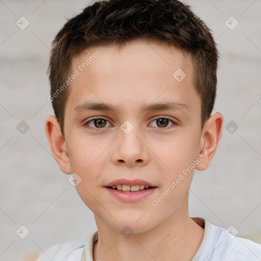 Joyful white child male with short  brown hair and brown eyes