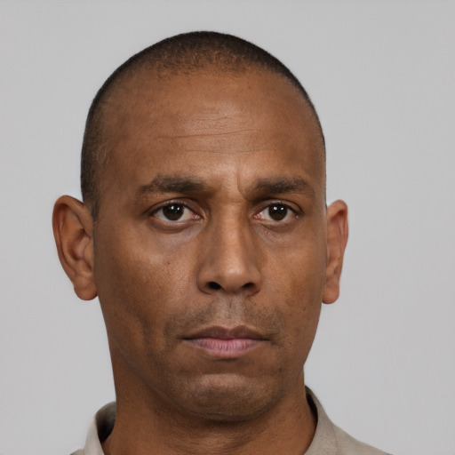 Neutral black adult male with short  black hair and brown eyes