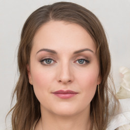 Neutral white young-adult female with medium  brown hair and grey eyes