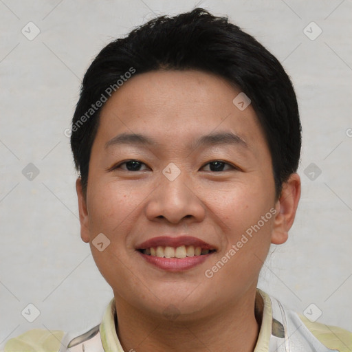 Joyful asian young-adult male with short  black hair and brown eyes