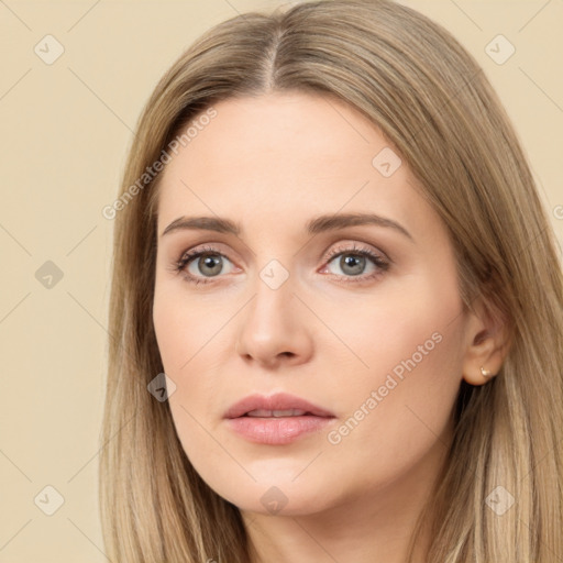 Neutral white young-adult female with long  brown hair and brown eyes