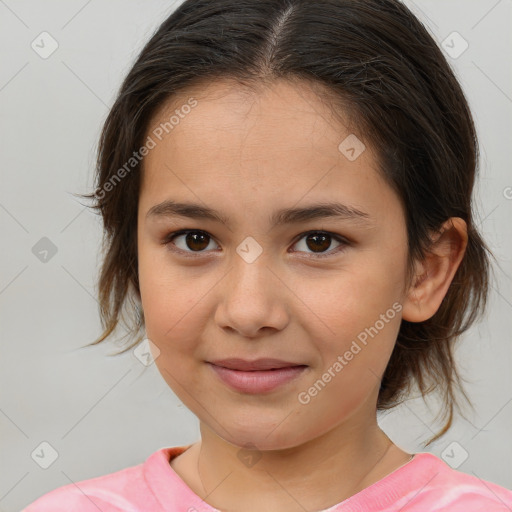 Joyful white child female with medium  brown hair and brown eyes