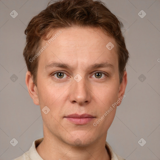 Joyful white adult male with short  brown hair and grey eyes