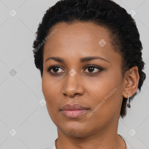 Neutral black young-adult female with short  black hair and brown eyes