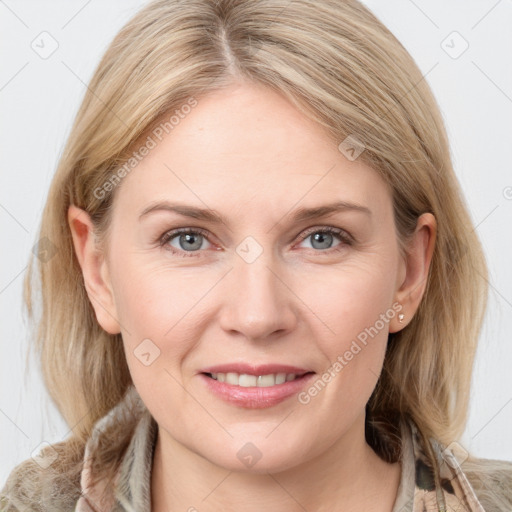 Joyful white young-adult female with medium  brown hair and blue eyes