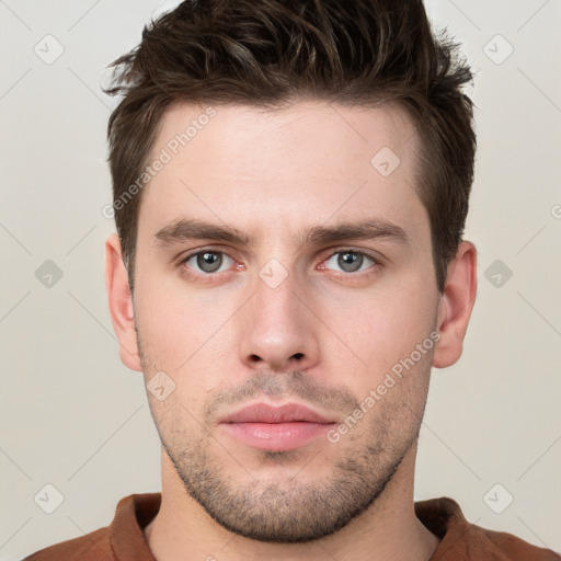 Neutral white young-adult male with short  brown hair and grey eyes