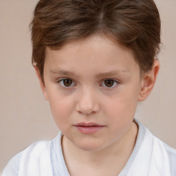 Joyful white child female with short  brown hair and brown eyes