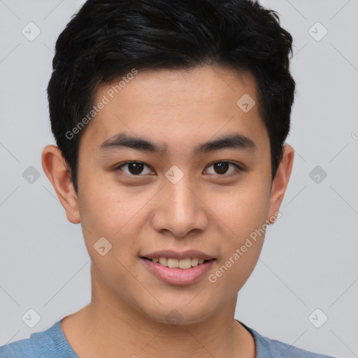 Joyful asian young-adult male with short  brown hair and brown eyes