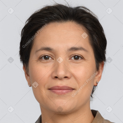 Joyful white adult female with short  brown hair and brown eyes