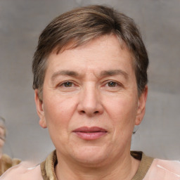 Joyful white adult male with short  brown hair and grey eyes