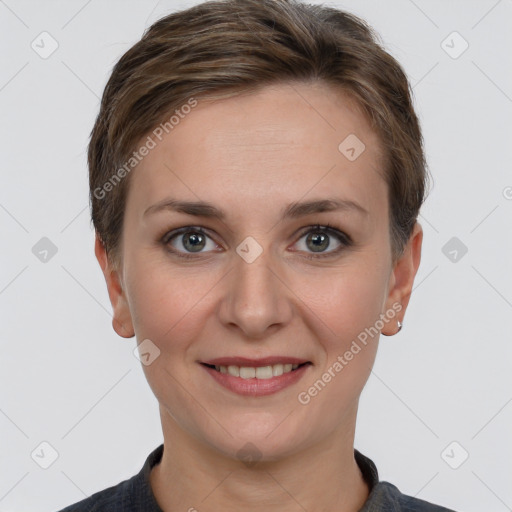 Joyful white young-adult female with short  brown hair and grey eyes