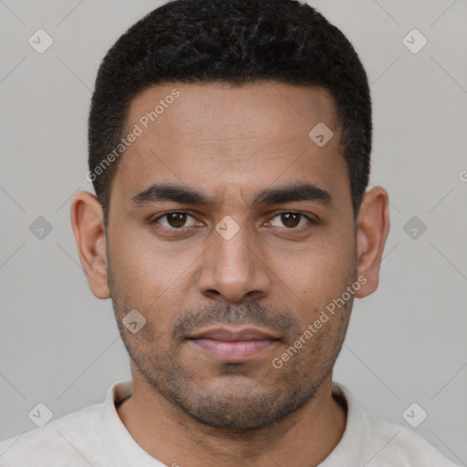 Neutral latino young-adult male with short  black hair and brown eyes