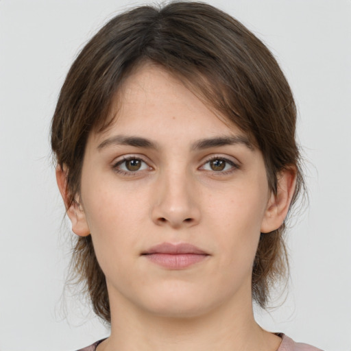 Neutral white young-adult female with medium  brown hair and brown eyes