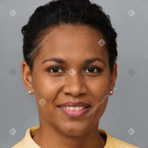 Joyful black young-adult female with short  brown hair and brown eyes