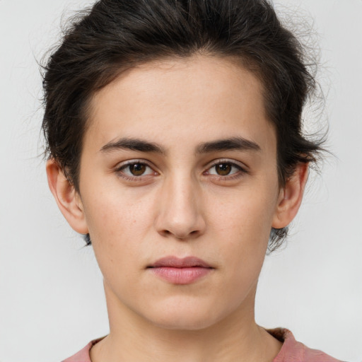 Neutral white young-adult female with short  brown hair and brown eyes