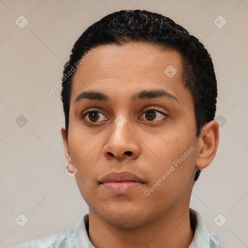 Neutral latino young-adult male with short  black hair and brown eyes