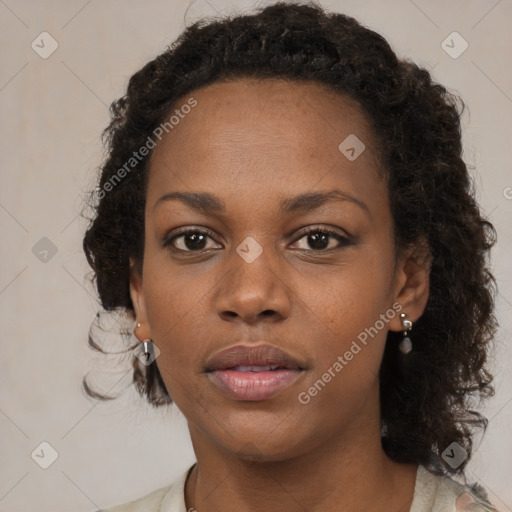 Neutral black young-adult female with medium  brown hair and brown eyes