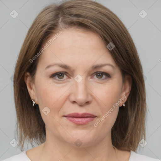 Joyful white adult female with medium  brown hair and grey eyes