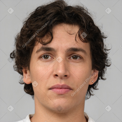 Neutral white young-adult male with medium  brown hair and brown eyes