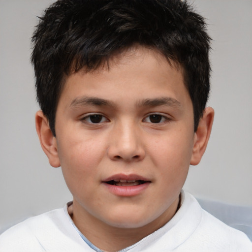 Joyful white child male with short  brown hair and brown eyes